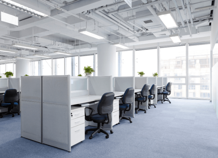 A clean office sits empty waiting for the businesses workers to return