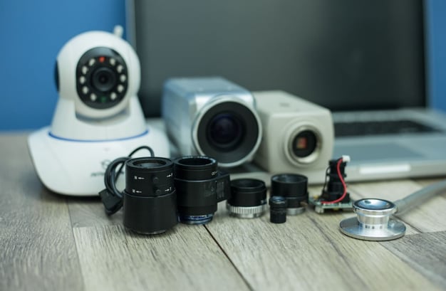 A selection of old cameras showing the evolution of intruder alarm and CCTV systems. 