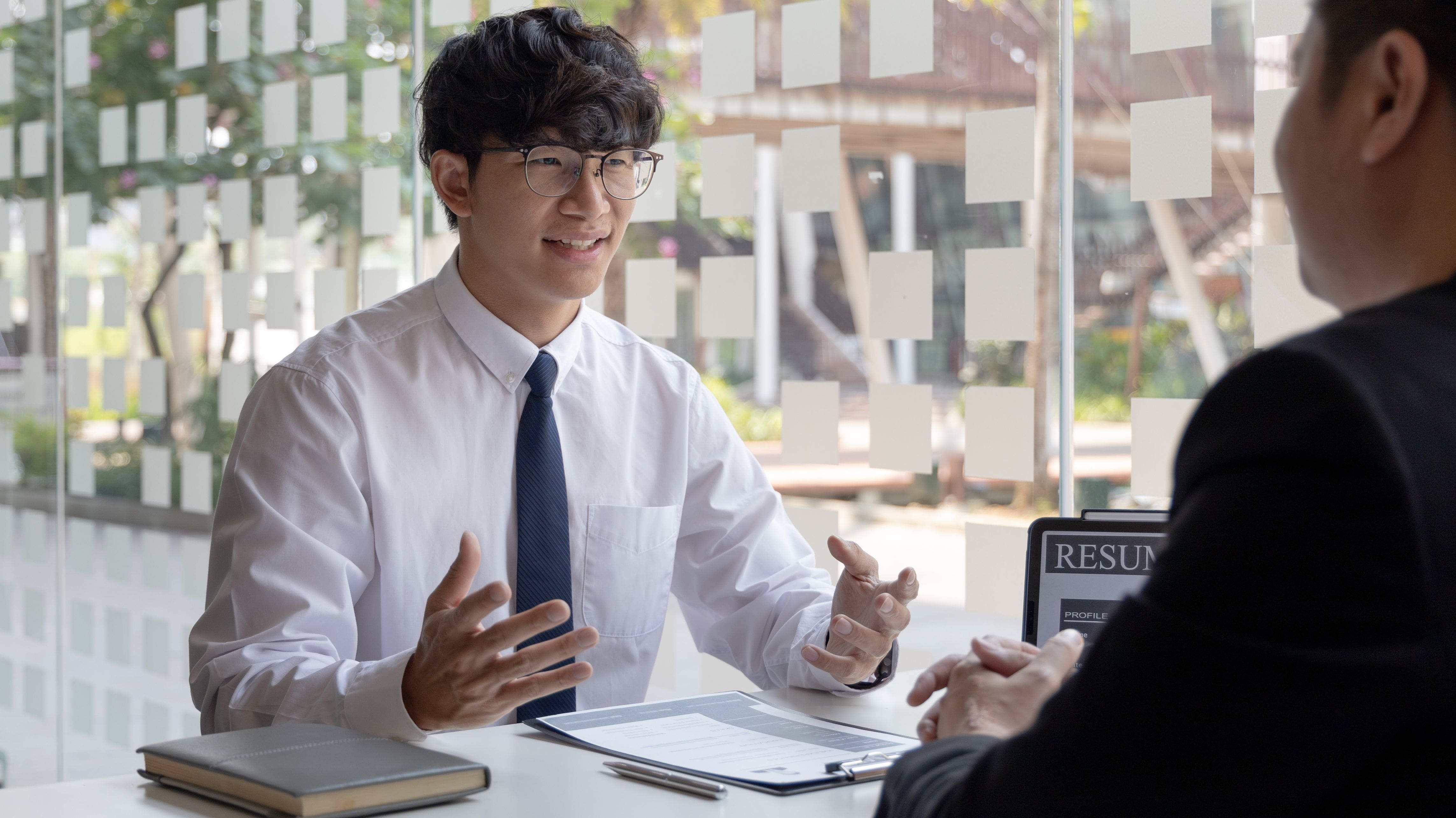 A person practising an interview as he is undergoing soft skills training.