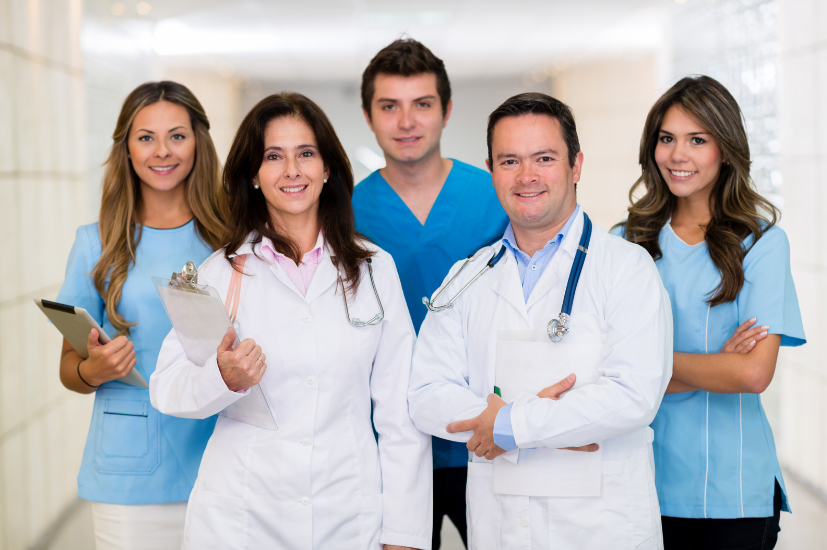 a group of healthcare professionals in a hospital to show strategies for good employee retention in healthcare